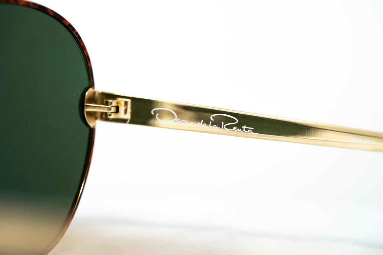 Oscar De La Renta Unisex Sunglasses Amber with Green Lenses - ODLR59C1SUN - Watches & Crystals